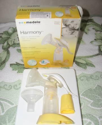 Молокоотсос ручной  фирма medela harmony Москва