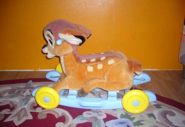 Музыкальная каталка -качалка Москва