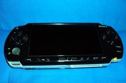 Прошитая PSP(недорого) Москва