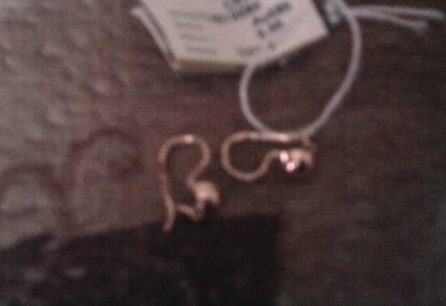 Первые золотые серьги для малышки Москва