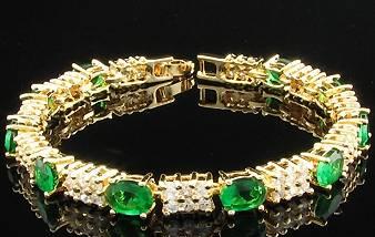 Роскошный браслет с изумрудами и топазами Москва