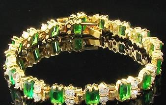 Роскошный браслет с изумрудами и топазами Москва