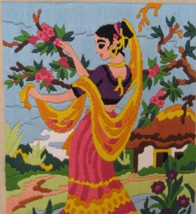 Вышитая картина. Собирающая цветы Москва