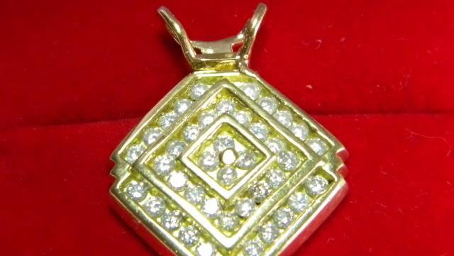 Подвеска из золота 750xС бриллиантами 1.20 ст Москва