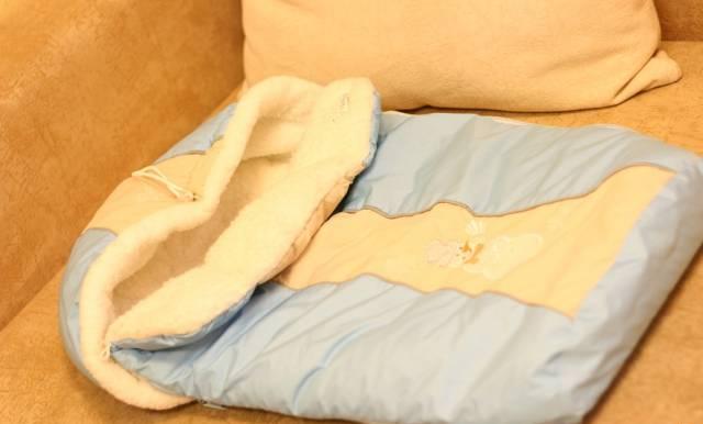 Меховой конверт с капюшоном дл новорожденного Москва