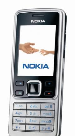 Nokia 6300 серебро в комплекте с блютуз-гарнитурой Москва