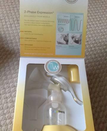 Ручной молокоотсос "Medela" Harmony + контейнеры Москва