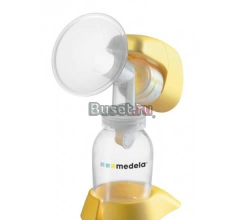 Молокоотсос Medela "Mini Electric" + бутылочки Москва