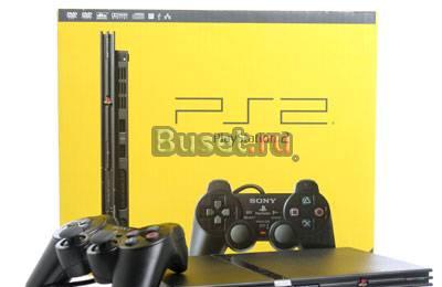 Продам PS2 Slim чипованную + 2 дж-ка и CD с играми Санкт-Петербург