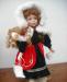 Кукла фарфоровая с коньками превью 1377591.