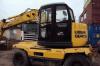 Экскаватор колёсный Komatsu UG128UU 2003 г.в превью 1394502.